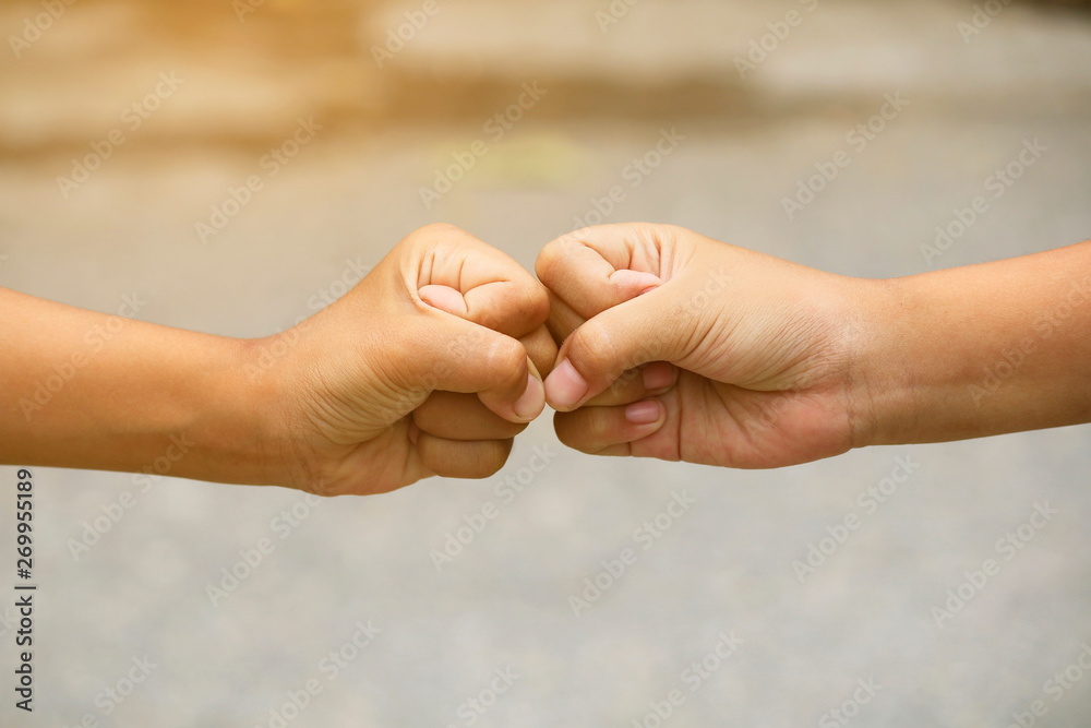 Close-up pictures of hands on a blurred background. Close-up pictures of hands on a blurred background.