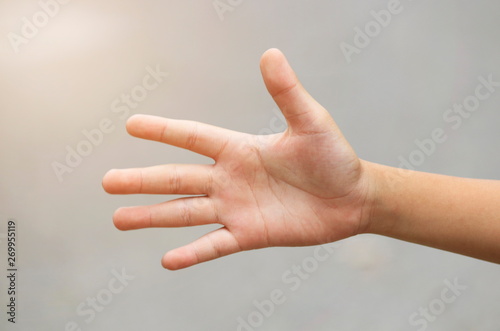 Close-up pictures of hands on a blurred background. © MRSUTIN