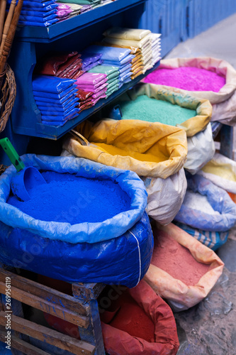 Various multi colored powder dyes in morocco. © alimyakubov