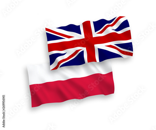 National vector fabric wave flags of Poland and Great Britain isolated on white background. 1 to 2 proportion.