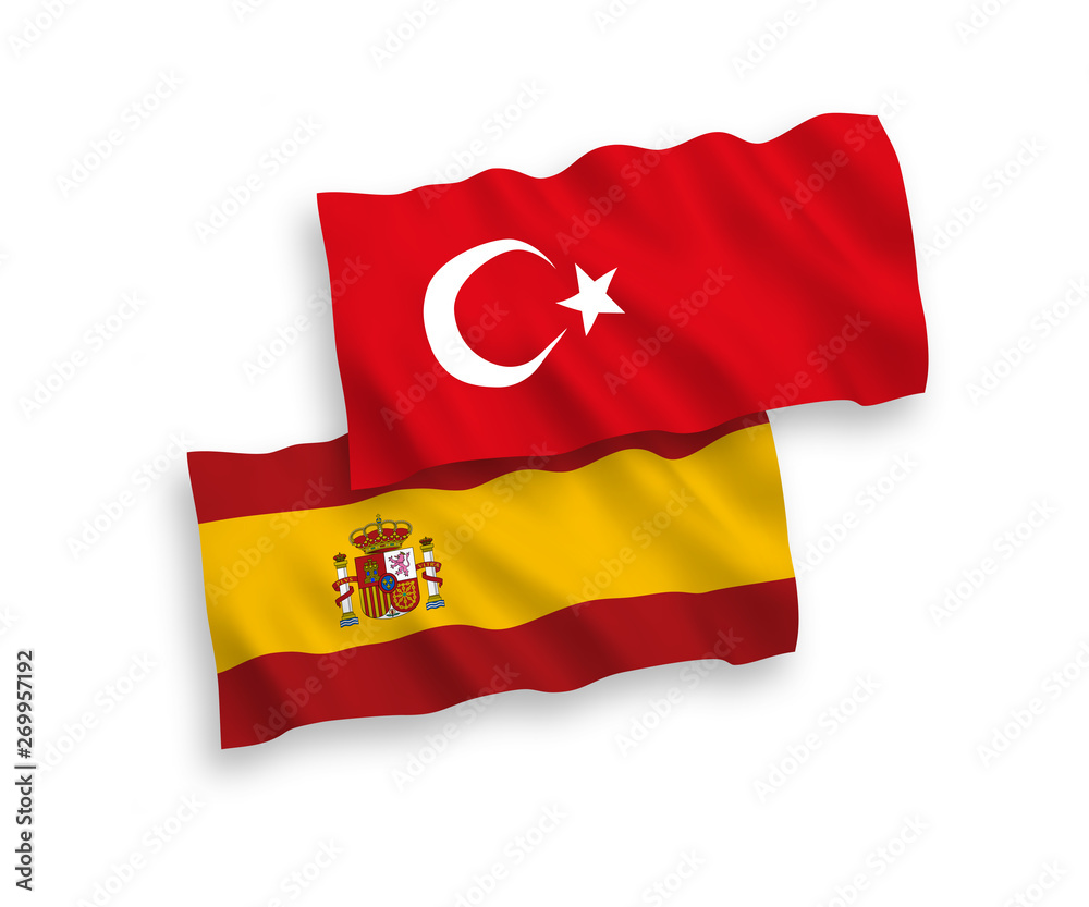 National vector fabric wave flags of Turkey and Spain isolated on white background. 1 to 2 proportion. National vector fabric wave flags of Turkey and Spain isolated on white background. 1 to 2 proportion.