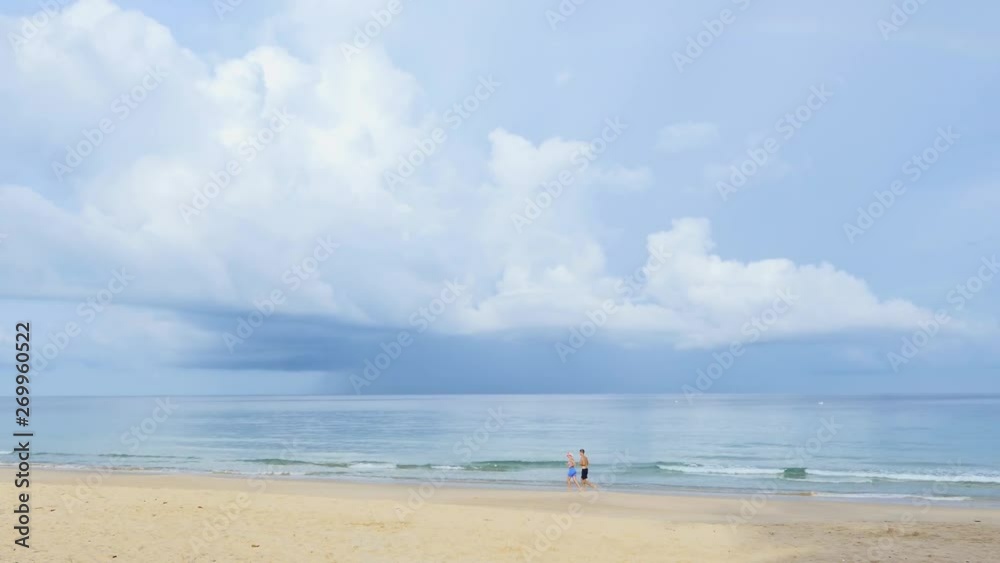 A time lapse of white clouds moving across a blue sky. A time lapse of white clouds moving across a blue sky.