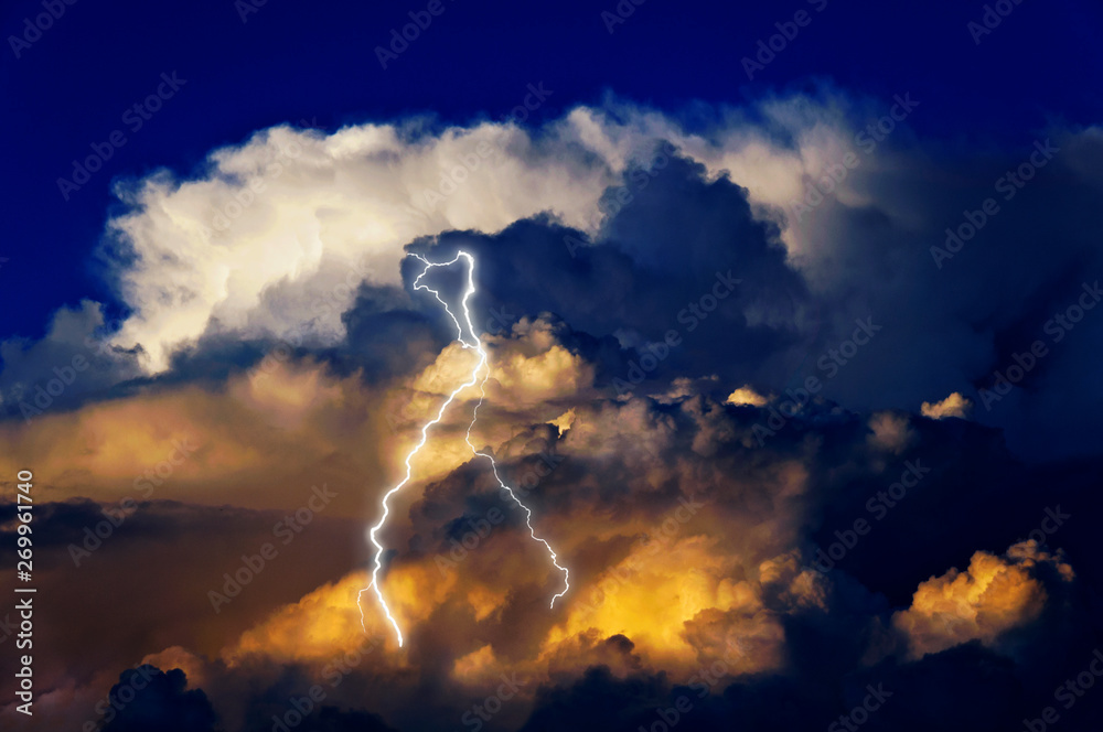 Stormy thunderhead clouds with lightning bolt Stormy thunderhead clouds with lightning bolt