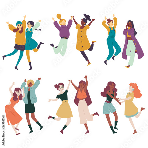 Diverse women having fun together, multi ethnic females jumping, dancing.