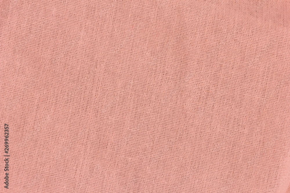 Coral textile texture for background with visible fibers Coral textile texture for background with visible fibers