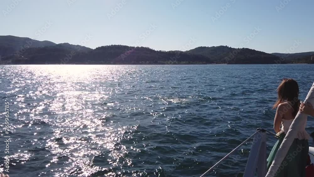 Watching dolphins on board of a catamaran in Setúbal bay. Watching dolphins on board of a catamaran in Setúbal bay.