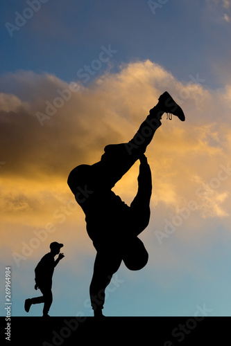 breakdance performer at sunset