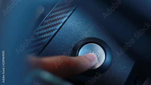 Starting and Stopping the Power of a car,Track in to the button. Finger press the button.