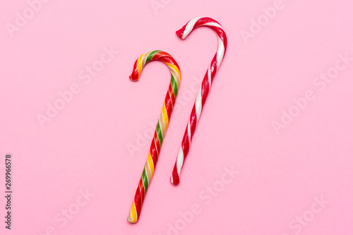 caramel cane on a pink background