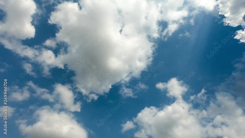 Time lapse,sky beautiful cloud scape white fluffy clouds over blue sky. Time lapse,sky beautiful cloud scape white fluffy clouds over blue sky.