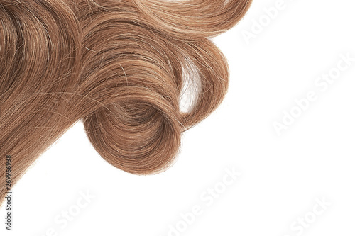 Brown hair isolated on white background. Backdrop with copy space