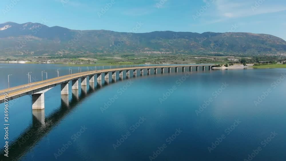 Techniti Limni Polifitou- Bridge over Polifitou Lake in Greece. Aerial- Tilting down. Techniti Limni Polifitou- Bridge over Polifitou Lake in Greece. Aerial- Tilting down.