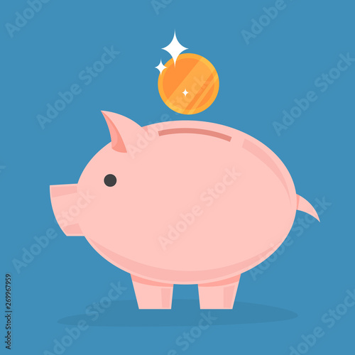 Golden coin falling in the piggy bank. Idea of economy