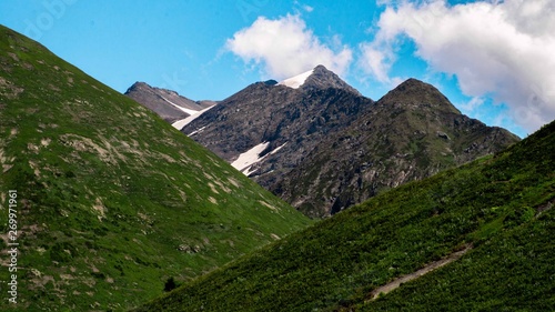 The peak of the mountain with a beautiful sky.