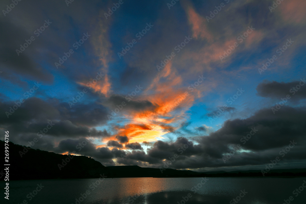A coulorful display of the clouds at sunset