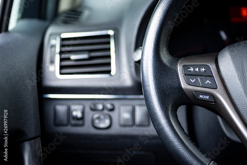 interior of a car, stearing wheel and buttons © picarts.de