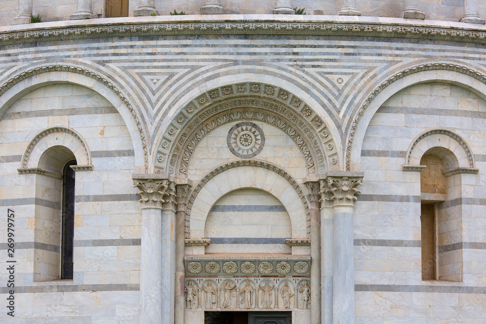 Pisa Baptistery of St. John, decorative details of facade, Piazza del Duomo, Pisa, Italy
