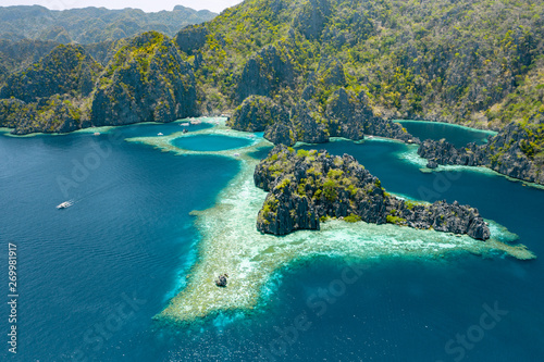Aerial view of beautiful lagoons and limestone cliffs of Coron, Palawan, Philippines © kbarzycki