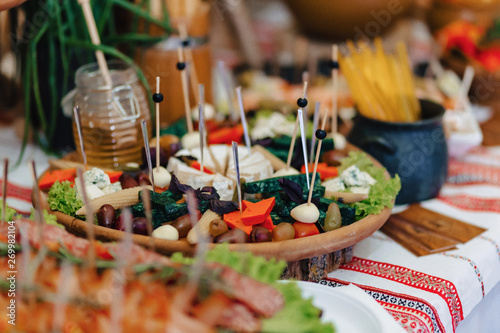 festive salty buffet, fish, meat, chips, cheese balls and other specialties for celebrating weddings and other events