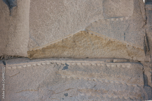 Detail of the cutting process of the unfinished obelisk of Aswan as part of a solid rock photo
