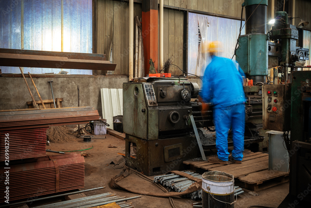 Workers are operating lathes Workers are operating lathes