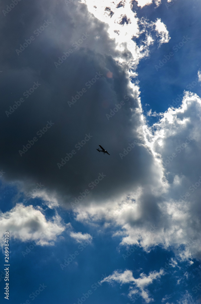 light aircraft against the sky with clouds light aircraft against the sky with clouds