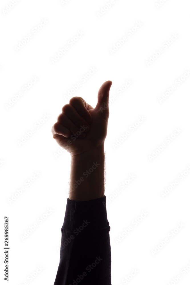 Hand young man with raised finger, like - silhouette concept abstraction Hand young man with raised finger, like - silhouette concept abstraction