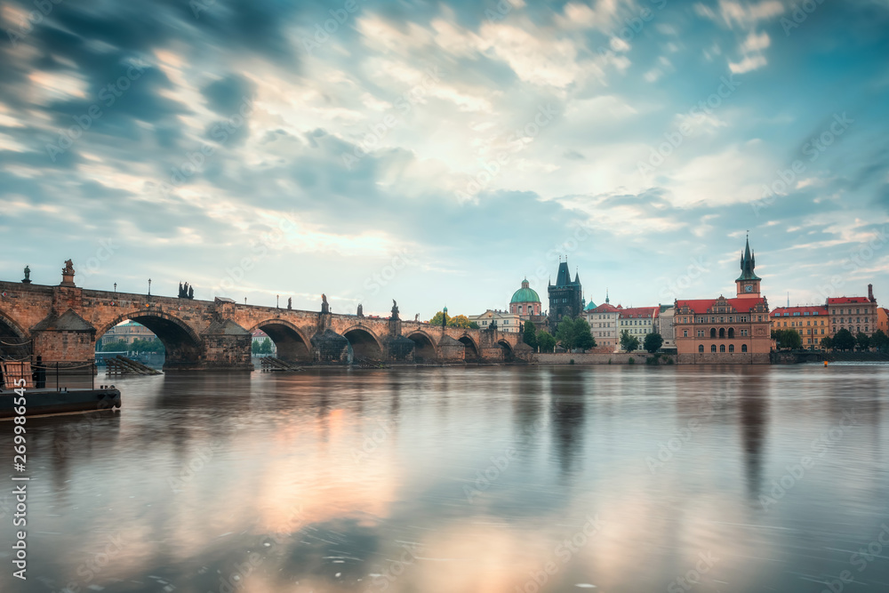 Obraz premium Beautiful morning view with Vltava river and Charles bridge in Prague, Czech Repiblic
