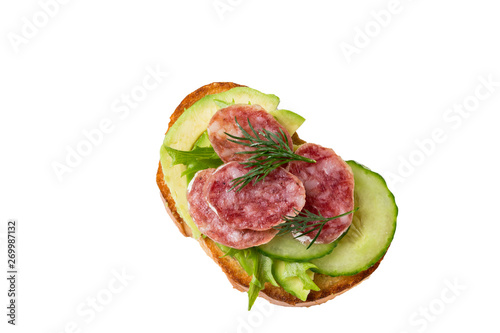 Sandwich with sausage, avocado and cucumber, isolated on white background.