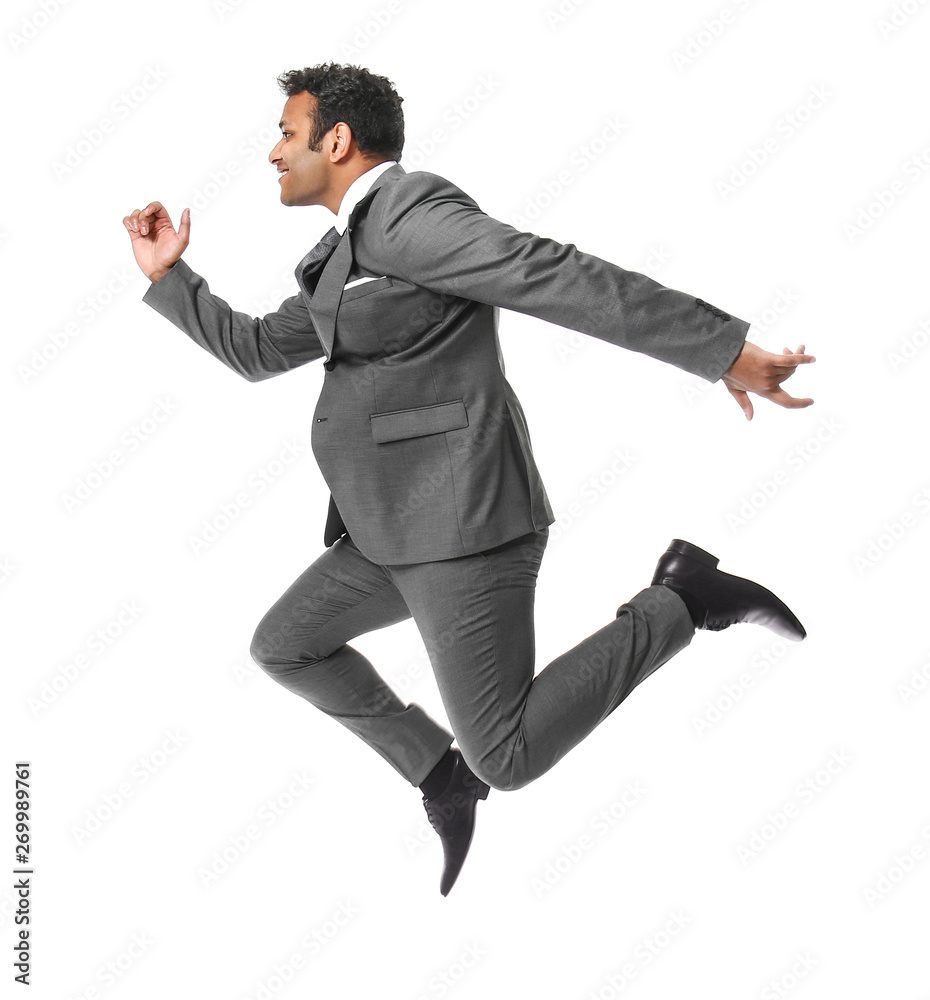 Jumping businessman on white background