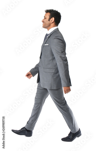 Handsome walking businessma...