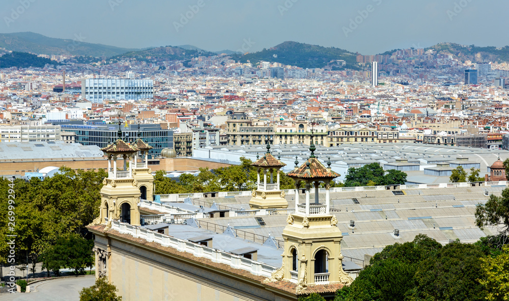 Mount Montjuic. View of Barcelona from the upper steps of the grand staircase of the National Palace. From the observation deck offers a beautiful view of the city.