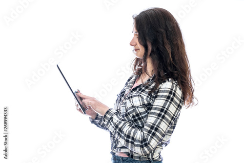 Woman with tablet isolated on white background