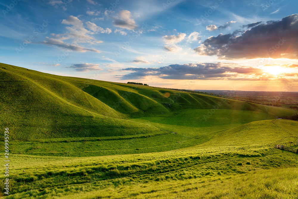 Fototapeta premium Dramatic sunset over The Manger at Uffington in Oxforshire,