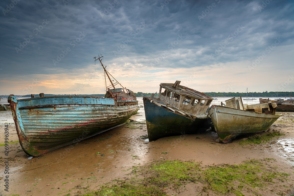 Old abandoned fishing boats on the River Orwell