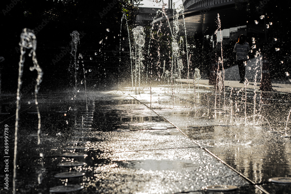 fountain in front of building fountain in front of building
