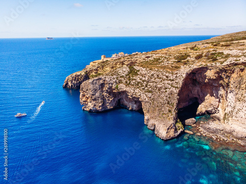 Wallpaper Mural Blue Grotto in Malta. Aerial top view from Mediterranean sea island of birds Torontodigital.ca