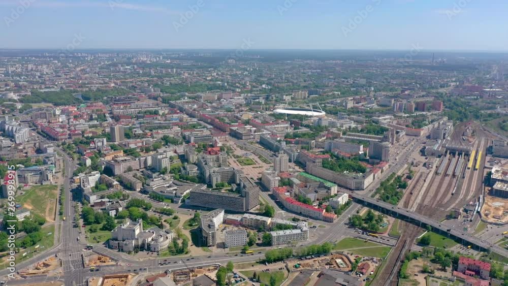 MINSK, BELARUS - MAY, 2019: Aerial drone shot view of city centre. Railway station and City Gates from above. MINSK, BELARUS - MAY, 2019: Aerial drone shot view of city centre. Railway station and City Gates from above.
