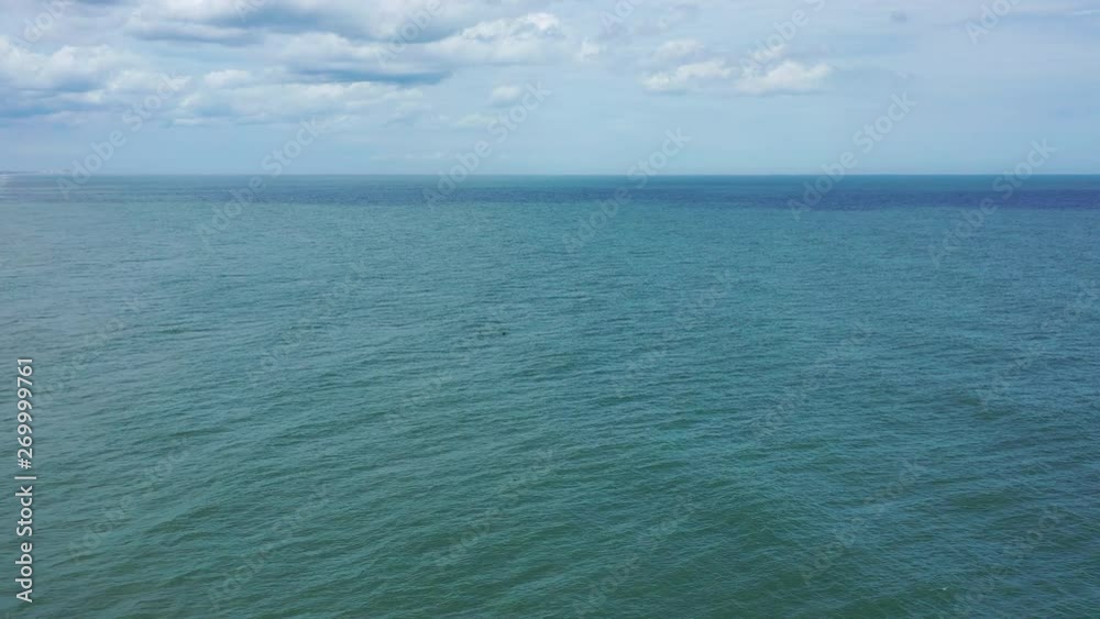 Aerial of drone flying over the ocean Aerial of drone flying over the ocean