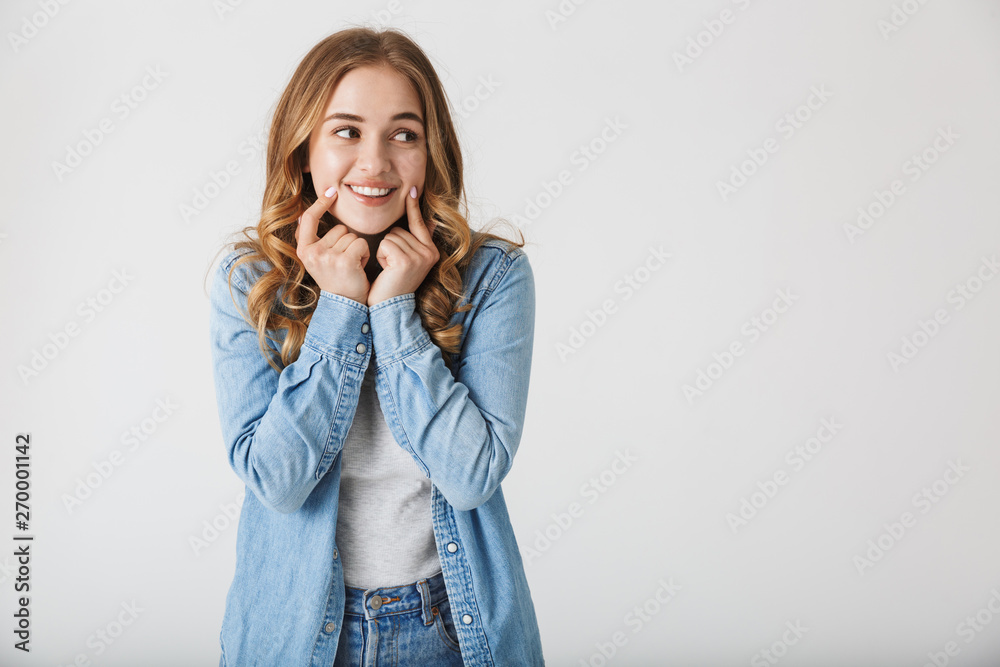 Attractive young girl standing isolated over white Attractive young girl standing isolated over white