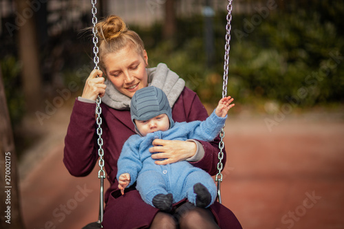 mother and child on swing