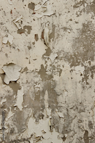 Abstract texture background. White paint on the gray wall. Old painted wall texture. Abstract grunge background with a lot of copy space for text.