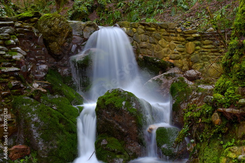 Incredible natural waterfall among the stones