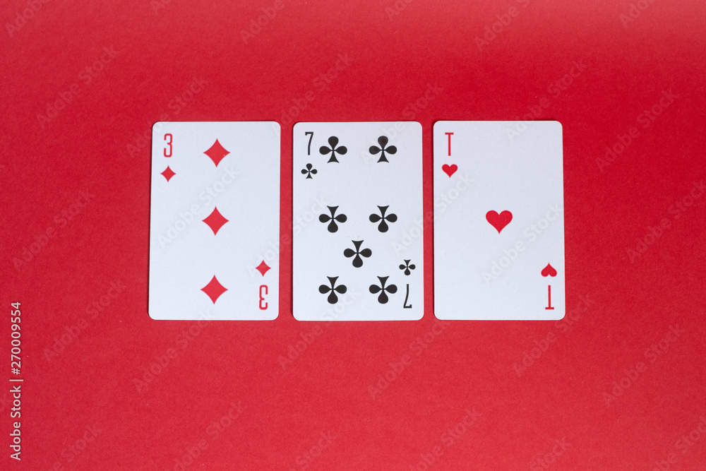 The combination of poker cards. three , seven, ace The combination of poker cards. three , seven, ace