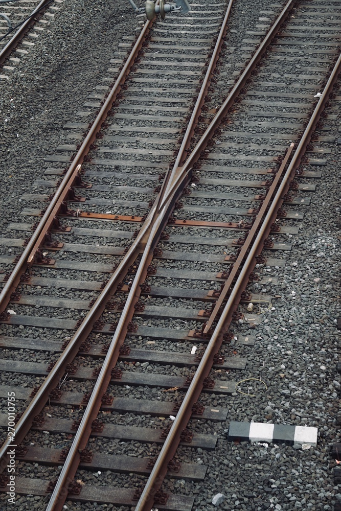 train railroad tracks in the street in the station train railroad tracks in the street in the station