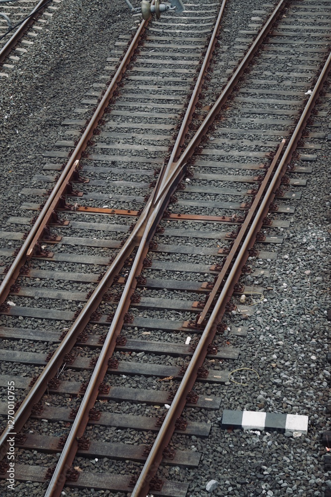 train railroad tracks in the street in the station