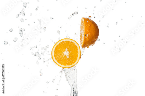 bright orange halves with water splash isolated on white