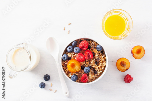 healthy granola for breakfast with berry fruit nut  vegan milk
