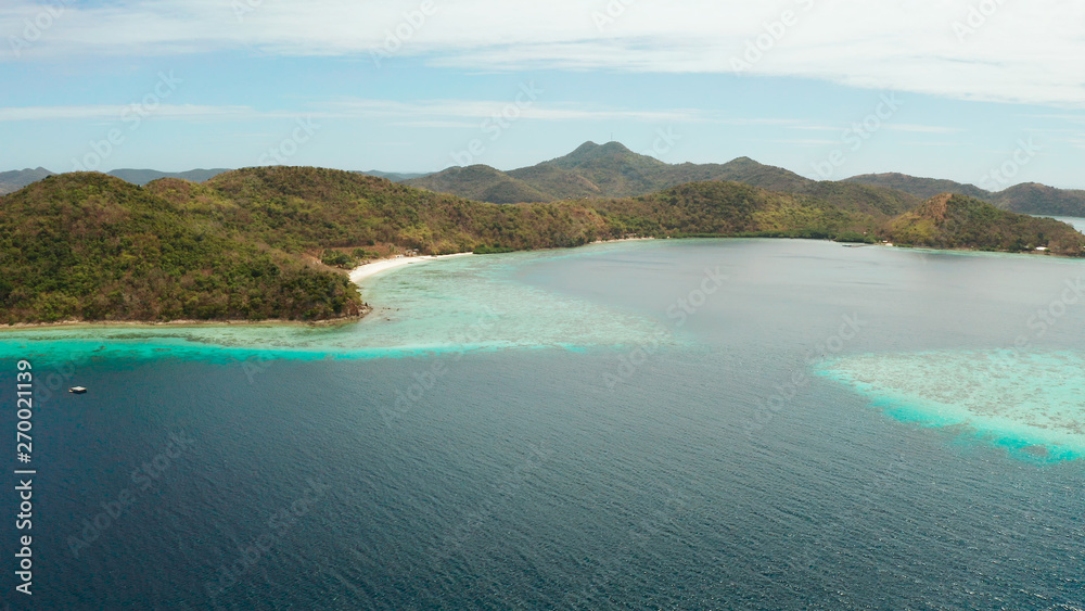 group tropical islands with white sand beach and blue clear water. aerial view seascape Philippines Palawan, Bulalacao