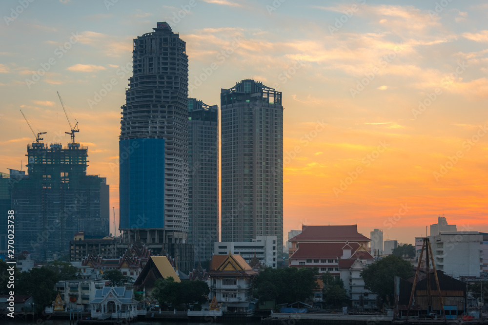 Bangkok cityscape view with unfinished skyscrapers construction